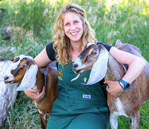 Dr. Michelle Buckley with two goats
