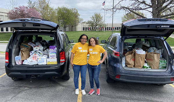 United Way food pantry donations loaded in two vehicles