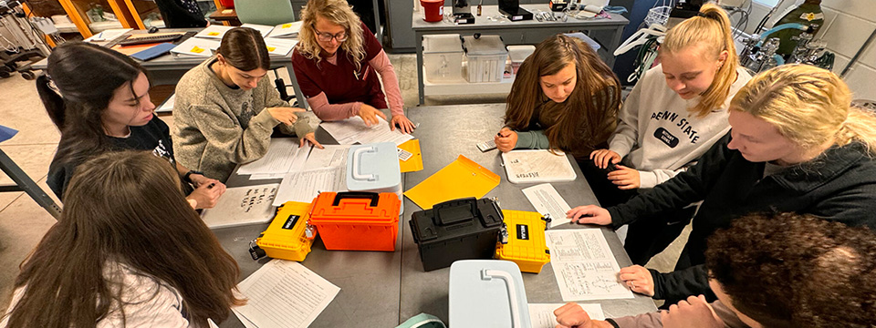 veterinary students reviewing the case clues