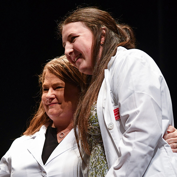 Dr. Alexis Newman (’98) with daughter Lily.