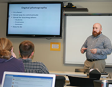 Dr. Locke Karriker instructing class