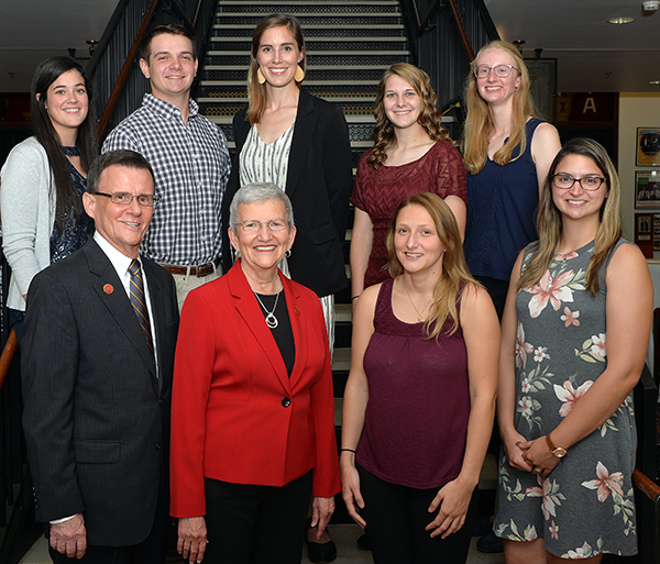 Lora and Russ Talbot with scholarship recipients