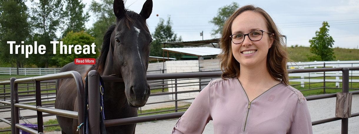 Dr. Jamie Kopper standing with horse