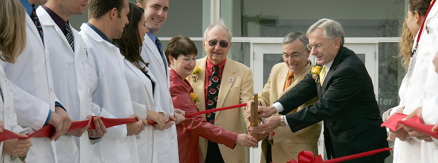 Eugene and Linda Lloyd at ribbon cutting ceremony